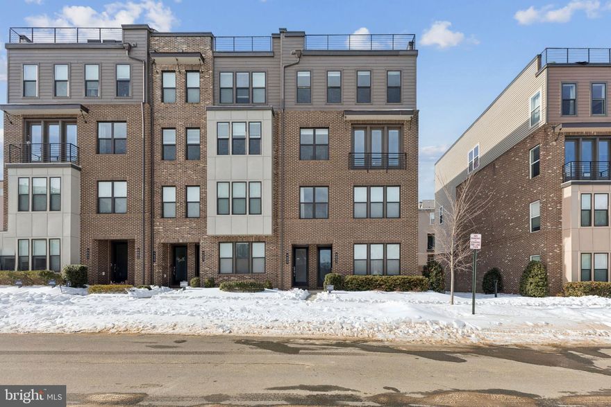 *** OPEN HOUSES: Saturday, February 7, 12–2 PM and Sunday, February 8, 11 AM–1 PM *** 
***UPDATES & FEATURES: 2026: fresh paint, professionally cleaned carpets on stairs, regrouted primary bathroom; All utilities 2020 with regular maintenance; 11' x 5' kitchen island with cabinetry on both sides with stool overhang; walk-in pantry; Balcony off living room; huge rooftop deck; UV filtering in HVAC via Enviroair UV air purification system *** Discover this meticulously maintained 3-bedroom townhouse with an expansive rooftop deck, located in the highly sought-after Commonwealth Place at Westfields. Built in 2021 and offering 2,170 square feet, this modern home features an open, airy floor plan ideal for both daily living and entertaining. 
The gourmet kitchen showcases quartz countertops, stainless steel appliances, and an oversized 11’ x 5’ island, flowing seamlessly into the spacious family room. The main level also includes a sun-filled office and a conveniently placed half bath.
Upstairs, the primary suite offers a spa-like bath with a walk-in shower and generous walk-in closets. Two additional bedrooms, a full bath, and a dedicated laundry room complete the second level. Elegant finishes are found throughout, including engineered wood flooring on all levels (with carpeted stairs at the ground level) and recessed lighting throughout.
Step outside to the expansive rooftop deck, where beautiful views create the perfect backdrop for entertaining or unwinding. Residents enjoy manicured common areas and walking paths throughout the community. Additional highlights include an attached rear-entry garage, exterior lighting, and an unbeatable location directly across from The Field at Commonwealth, home to Wegmans, popular restaurants, shops, and convenient access to public transportation.