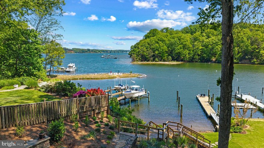 Picturesque Craftsman-style waterfront cottage in Epping Forest! Mornings begin with coffee on the porch as the water glistens across Saltworks Creek and stretches out to the Severn River, while evenings are spent gathered by the firepit, watching boats drift by under painted skies. Welcome to effortless waterfront living in the private, gated community of Epping Forest where every day feels like a getaway and every detail is designed for ease.

This completely renovated property offers the perfect balance of charm, comfort, and low-maintenance living, making it an ideal full-time residence or lock-and-go retreat. New owner’s thoughtfully completed the whole house renovation in the last year, with additional second floor Restoration Hardware full bath, creating beautiful 2nd upper level bedroom suite, updated kitchen and appliances, new first floor flooring, custom designed kitchen pantry and primary bedroom closet by Chesapeake Closets, raised lower level ceiling to 10’, fresh paint inside and out, all decks and staircase to water polyurethaned, significant landscaping and hardscaping of entire property with expanded driveway to 3-4 cars, new Ring security system and Leaf Gutter system, and more! Previous owner recent improvements in last 1 to 2 years include, new second floor dormer, covered balcony, windows and flooring, new primary bedroom full bath and lower level full bath with Restoration Hardware, new 1st floor gas fireplace and mantel, new roof, new pressure treated stairs to water, new deep water 50’ floating dock with water and power. The home is move-in ready and designed to maximize both lifestyle and convenience.

Inside, tall ceilings and walls of windows invite natural light to pour in while framing the surrounding landscape and wide, open water views. The open floor plan creates an easy flow between the gourmet kitchen, dining area, and living room with fireplace, all seamlessly extending to the waterside covered porch, an inviting space for al fresco dining, morning breezes, or unwinding after a day on the water.

Upstairs, two ensuite bedrooms provide private retreats, including a serene primary suite with its own balcony overlooking the water, perfect for capturing sunsets and summer breezes. The lower level offers additional flexibility with a family room, guest bedroom, and full bath, ensuring plenty of space for visiting family and friends.

Outdoors, the boating lifestyle takes center stage. The recently built deep-water floating dock with a 50-foot slip, complemented by a dedicated mooring ball, creates an exceptional setup for effortless days on the water with quick access to the Severn River, Annapolis Harbor, and the Chesapeake Bay beyond.

Epping Forest enhances the experience with a vibrant, amenity-rich setting, offering a clubhouse with waterfront dining, deep-water marina, sandy beach, boat ramp, tennis courts, and scenic walking trails, along with a full calendar of social events and clubs. All just minutes from downtown Annapolis and convenient commuter routes, this is a rare opportunity to enjoy a truly turnkey waterfront lifestyle in one of the area’s most cherished communities. Epping Forest is a Special Tax District ($2,934.96/yr.) with binding Rules & Regulations. Welcome Home!