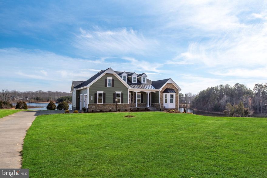 Nestled within the serene enclave of Hunting Run Estates, this exquisite new construction home, set to be completed in 2026, offers a luxurious lifestyle surrounded by nature's beauty. Spanning over 6.24 acres, this property boasts a harmonious blend of modern craftsmanship and timeless design, featuring a stunning combination of Craftsman and Ranch architectural styles. As you step inside, you are greeted by an open floor plan that seamlessly connects the gourmet kitchen to the family room, creating an inviting space perfect for both entertaining and everyday living. The kitchen is a chef's dream, equipped with stainless steel appliances, including a double oven, built-in microwave, and a cooktop, complemented by upgraded countertops and a spacious island. The formal dining room provides an elegant setting for special occasions, while the cozy family room, complete with a gas fireplace, invites relaxation and warmth. The interior features are thoughtfully designed for comfort and convenience, including a luxurious primary bath with a soaking tub and walk-in shower, as well as ample storage with walk-in closets. Beautiful wood floors and plush carpeting enhance the home's inviting atmosphere, while the main floor laundry adds practicality to your daily routine. The partially finished basement offers endless possibilities, whether you envision a recreation area, home gym, or additional living space. With an outside entrance and sump pump, this area is both functional and versatile. Outside, the property is a true retreat, backing to trees and offering panoramic views of the tranquil Hunting Run Reservoir. Enjoy the peaceful ambiance of rural living while being just a stone's throw away from the water's edge. The lot features a mix of cleared and wooded areas, providing a perfect backdrop for outdoor activities or simply unwinding in nature. Parking is a breeze with an attached three-car garage and an expansive asphalt driveway that accommodates multiple vehicles. The cul-de-sac location ensures privacy and a sense of community. This exceptional property is not just a home; it's a lifestyle choice that embraces luxury, comfort, and the beauty of nature. Experience the perfect blend of modern amenities and serene surroundings in this stunning new construction masterpiece. ALL PHOTOS ARE OF A SIMILAR DALTON MODEL IN HUNTING RUN ESTATES. FINAL FINISHES MAY DIFFER THAN THE ONES IN THE PHOTOS.