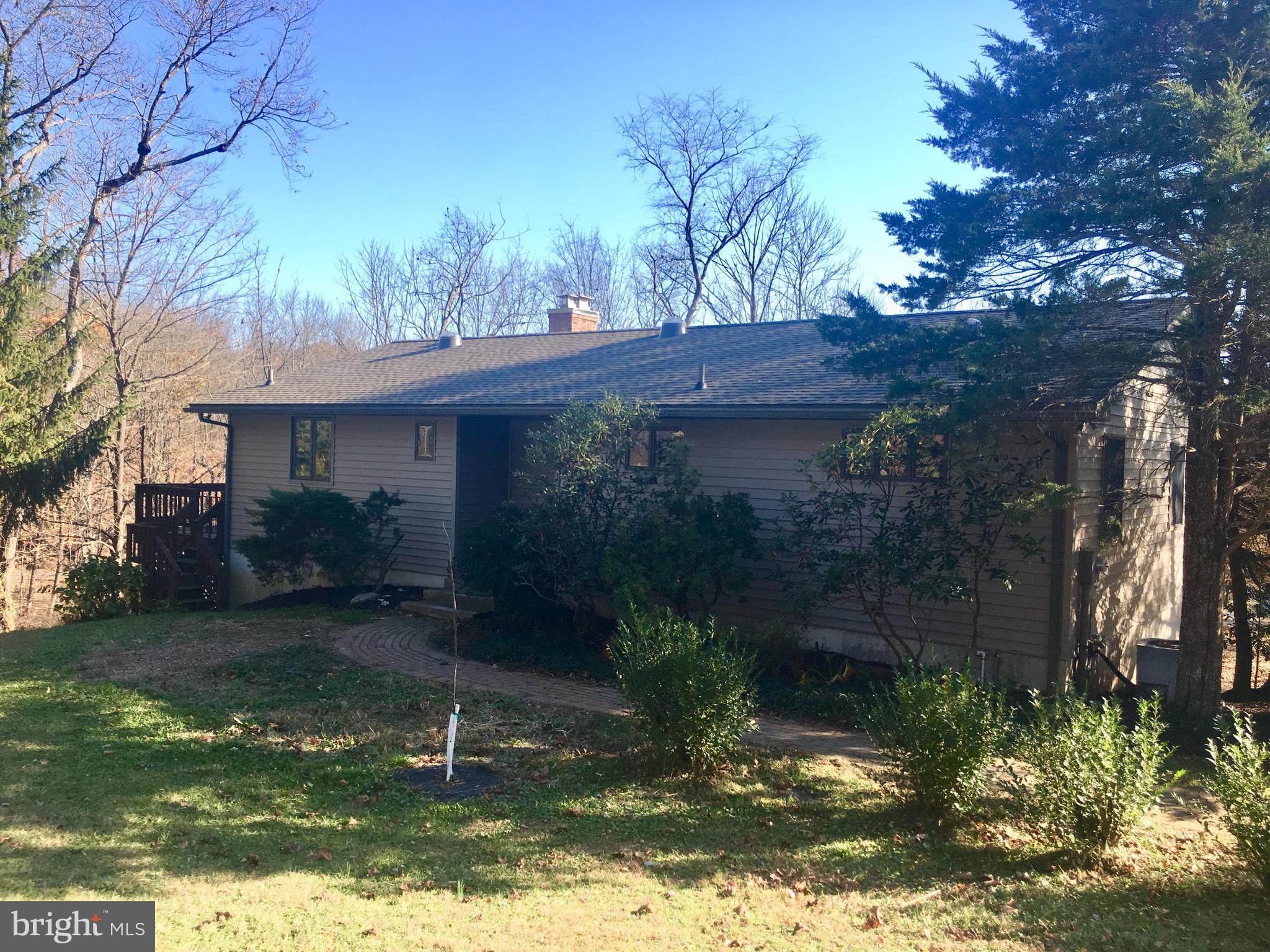 Beautiful country ranch home with gleaming hard wood floors and a wall of windows overlooking the amazing surrounding countryside. This 4 bdrm, 3 bath home awaits a new tenant. The full kitchen comes with refrigerator and dishwasher. 2 bedrms, 2 baths on main level, 2 bedrms, 1 bath on lower level which is walkout and has laundry area with washer and dryer included. There is a side deck and great screened porch. A whole house generator keeps you in operation even during a storm. This outstanding country location is less than 15 minutes from Rt 78, but offers a retreat you'll be happy to come home to. No smoking in house,No Pets, credit and background check required.