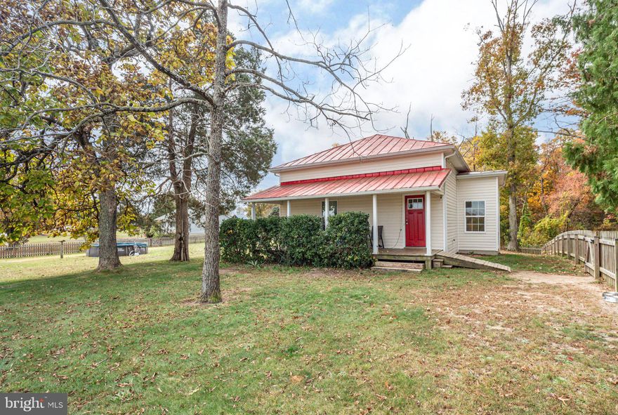 Don't miss out on this adorable 3 bedroom 2 bathroom home that was fully renovated in 2018.  This split bedroom design is a perfect starter home, or someone looking to downsize.  The main area has lvp, the bedrooms have carpet and the bathrooms have ceramic tile on the floors.  The kitchen has granite countertops, white cabinets and ss appliances.  Enjoy your mornings or evenings sitting on the front porch enjoying a cup of coffee or your favorite beverage.  Plenty of yard space for kids or pets to run around in and enjoy a circle driveway.  The home is in the "country" but does offer Xfinity for cable/internet!