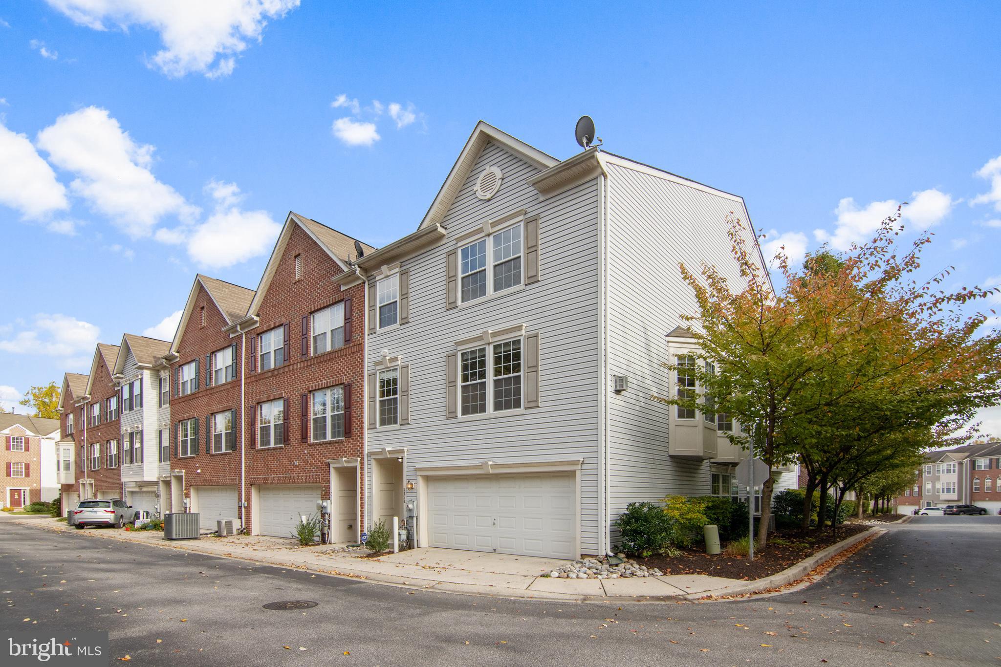 **** PROPERTY DOES QUALIFY FOR FHA/VA LOANS!**** DON'T LIKE EXTERIOR MAINTENANCE? TIRED OF MOWING LAWNS? THEN TAKE ADVANTAGE OF THE CONDO LIVING LIFESTYLE ALL WHILE LIVING IN A TRUE, 3 LEVEL, MASSIVE 2 CAR GARAGE, 3 UPPER LEVEL BEDROOMS WITH PLANT SHELVES THAT WILL CONVEY, ALL WITH 15 FT. CEILING HEIGHTS AND 2 FULL BATHROOMS IN THIS END OF GROUP TOWNHOUSE! THE CONDO FEE COVERS ALL EXTERIOR MAINTENANCE INCLUDING THE ROOF, COMMON AREA MAINTENANCE & OUTDOOR POOL MEMBERSHIP. TAKE ADVANTAGE OF THE LIGHT FILLED END UNIT ON THE MAIN FLOOR WIHCH INCLUDES A GOURMET KITCHEN WITH UPDATED STAINLESS STEEL APPLIANCES, 42 INCH CABINETS & GRANITE COUNTER TOPS WHICH SPILL OVER THE VAST LIVING ROOM WHICH IS ALL COVERED WITH QUARTER INCH HARD WOOD FLOORS. FALL IN LOVE WITH A SEPARATE FORMAL DINING ROOM WITH BAY WINDOWS THAT ALLOW EXTRA LIGHT. COZY UP TO THE MAINTENANCE FREE GAS FIRE PLACE RIGHT NEXT TO YOUR CONVENIENT POWDER ROOM. OR RELISH THE EXTRA SPACE AFFORDED BY THE LOWER LEVEL BASEMENT BONUS/REC/OFFICE ROOM. HAVE PEACE OF MIND WITH NEWER WASHER & DRYER INCLUDED IN UNIT AND CENTRAL DEHUMIDIFIER ON HVAC SYSTEM. ALL CARPET IS BRAND NEW MOHAWK CARPETING WITH 8 INCH DOUBLE PADDING FOR EXTRA SOFTNESS. APPRECIATE THE OVER FLOW PARKING DIRECTLY IN FRONT OF UNIT AND ALL OF THE OTHER COMMUNITY AMMENITIES INCLUIDNG PLAYGROUND, CLUB HOUSE & OUTDOOR POOL. TAKE NOTICE OF BEST PLOT AND ELEVATION AVAILABLE IN ENTIRE COMMUNITY. CLOSE TO SHOPS, MAJOR HIGHWAYS AND PUBLIC TRANSPORTATION ALL WHILE ATTENDING AWARD WINNING HOWARD COUNTY SCHOOLS! COME TAKE A LOOK IN PERSON OR CHECK OUT THE VIRTUAL WALK THROUGH TOUR TODAY!