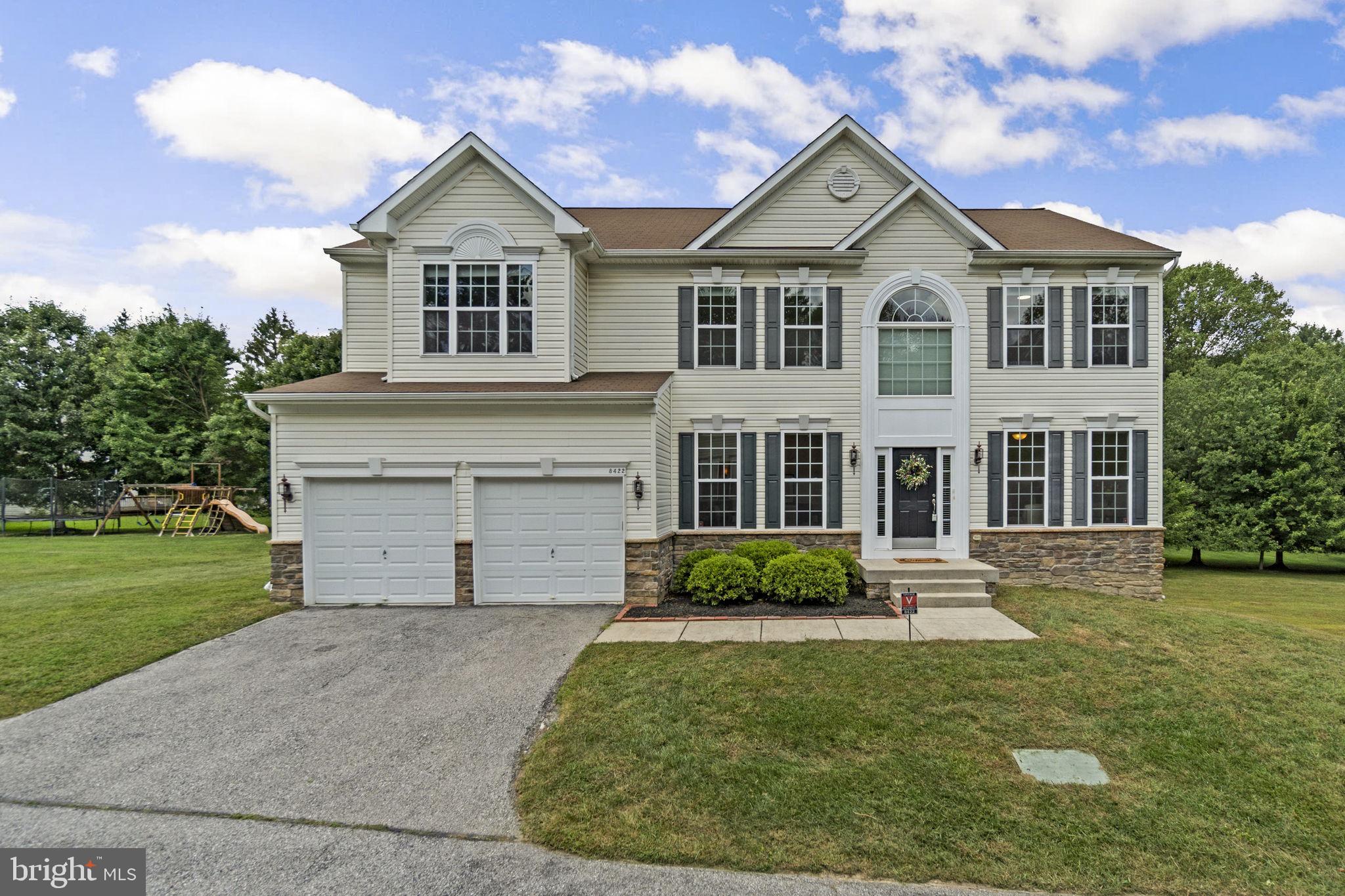 Beautifully updated Colonial, lovingly maintained by its original owners, tucked away on a quiet cul-de-sac in desirable Horseshoe Heights. Hardwood floors flow throughout the main level, where bright, airy living spaces feel fresh and like new. The simple yet sophisticated design choices create a timeless backdrop that’s easy to make your own. The welcoming two-story foyer opens to a formal living room on the right and a formal dining room on the left, both accented with chair rail and wainscoting details. The eat-in kitchen is the heart of the home, featuring a central island with breakfast bar seating, chic cabinetry, stainless steel appliances including a 5-burner gas cooktop, granite countertops, a pantry, and a cozy breakfast area. From here, enjoy views of the two-story family room, complete with a gas fireplace and striking palladium windows that flood the space with natural light. Off the family room, a dedicated study with wainscoting and chair rail offers the perfect home office. A well-appointed laundry room and a convenient powder room complete the main level.
Upstairs, a lofted hallway overlooks the main level, enhancing the home’s open, airy feel. Here you’ll find four carpeted bedrooms and three full baths, including the expansive owner’s suite with a spa-inspired bath featuring a corner soaking tub, frameless glass-enclosed shower, and dual sink vanity. One secondary bedroom serves as a guest suite with its own walk-in closet and private bath. The partially finished walkout lower level offers a large, open recreation room with endless possibilities. Outdoors, the spacious backyard is surrounded by mature trees, creating a tranquil, private setting—perfect for relaxing.