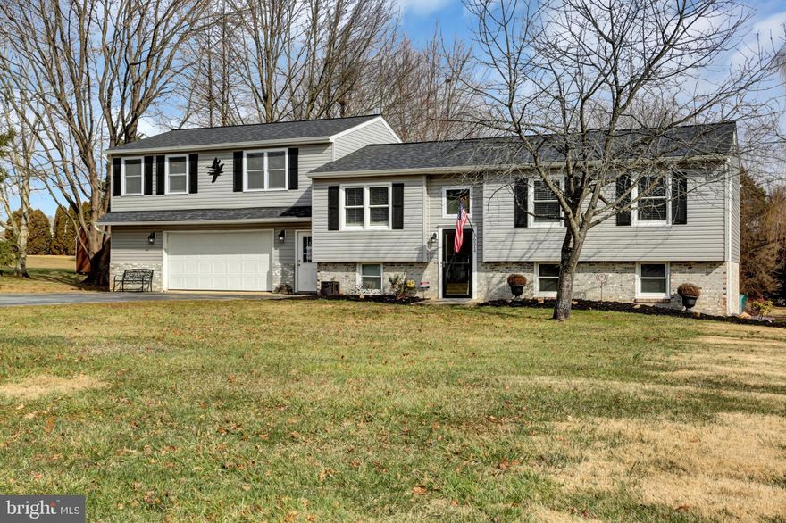 *****Welcome Home! 4 Bedrooms, 3 and a half Baths, Split foyer with oversized front loading 2 car garage! This LARGE Split/Colonial in beautiful Carroll County. You will feel like you are in the countryside but only minutes away from shopping and major routes. The bedrooms have been enlarged to give a feel of space and privacy. Master with large walkin closet. The front and rear yards are HUGE with lots of room to play! Over-sized garage for all the toys! A must see and a great value. **Newer roof, siding, kitchen, deck, windows and door.**