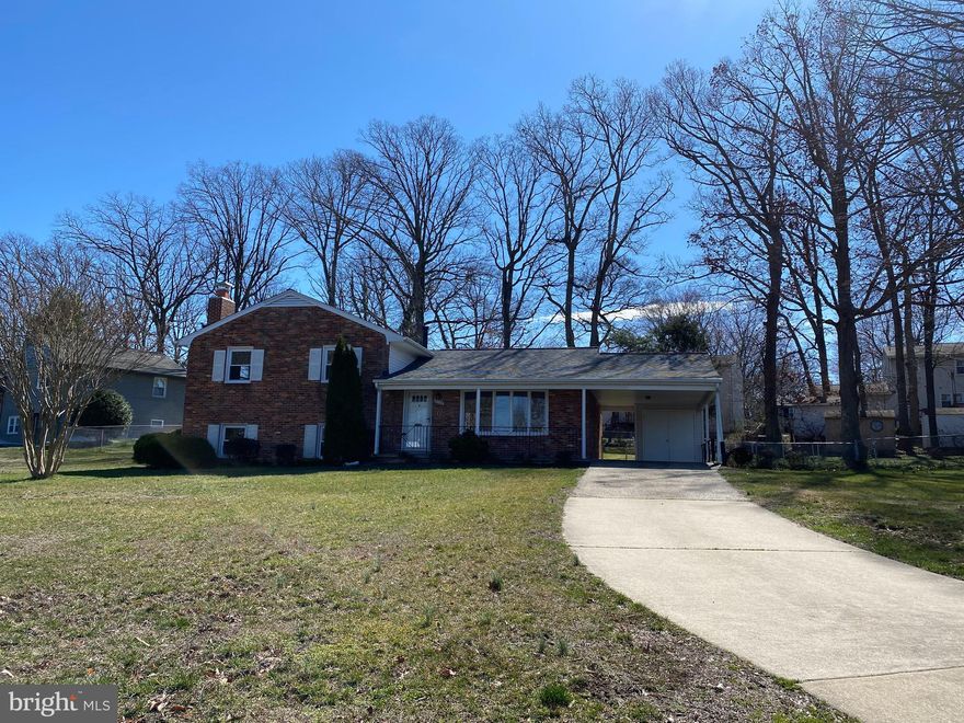 This home is super clean and freshly painted. Large open floor plan and plenty of storage. It gets tons of light on all three levels. Hardwood floors. Fireplace. Replacement windows. Carport. Long driveway off street. Huge fenced rear yard. Walk out lower level. Near the Metro and close to shops and restaurants. Also close to all commuter routes. Beautiful setting on a lovely street. Check it out!