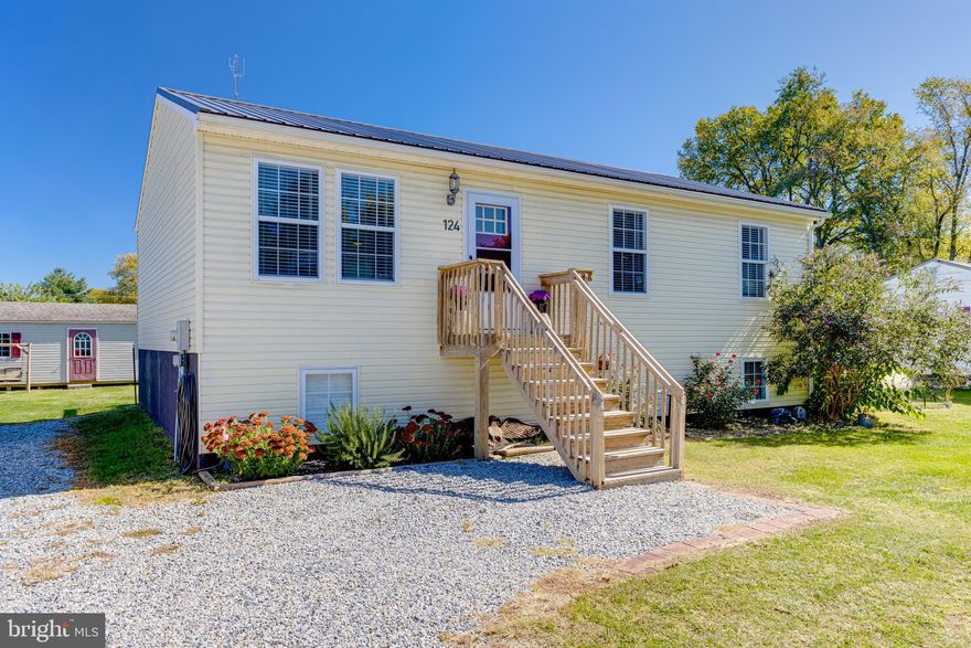 Beautifully updated and pristine inside! Eat-in kitchen includes soft close cabinets and drawers, granite counter tops, matte black deep sink, sleek black stainless steel appliances, and a large pantry.  The entire main level has been freshly painted, and includes newly installed waterproof luxury vinyl flooring.  Primary bedroom includes private full bath.  Both full bathrooms have new toilets, vanities, and medicine cabinets.  All interior doors feature matte black door knobs and hinges.  The clean and dry unfinished basement with egress windows, is ideal for adding additional living space.  Another full bath can also be added.  New metal roof installed in 2023.  All that's left to do is move in!