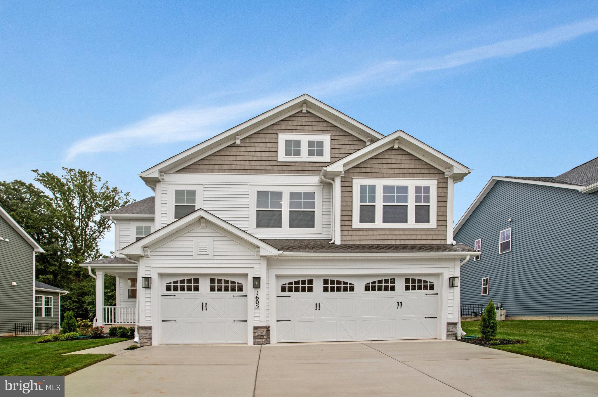 This Yorktown home offers an expansive entertaining space at the back of the home: the great room with a fireplace, dining room overlooking the backyard, and the kitchen with a large center island. The 3-car garage leads to a convenient mudroom with walk-in closet and optional keydrop, a powder room and a private study. On the second floor, there's an immense loft surrounded by three bedrooms, a shared bath, a laundry room and a primary suite with its own bath and spacious walk-in closet. This home includes a sunroom and finished basement with a bathroom.