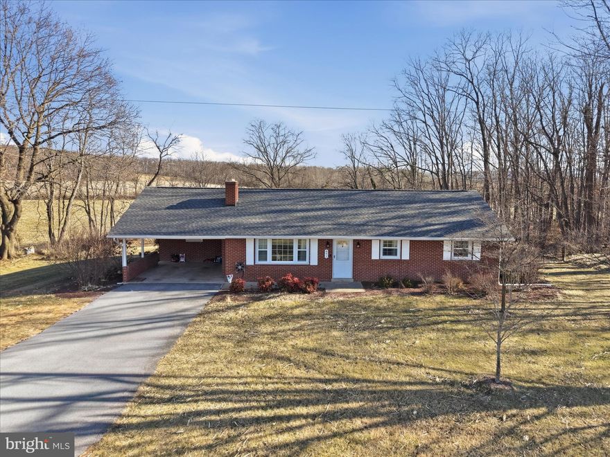 Completely remodeled and truly move-in ready, this beautifully updated home offers modern style, thoughtful upgrades, and a location that’s hard to beat. Every major system and living space has been improved, giving buyers peace of mind and the feeling of a brand-new home.
Enjoy the best of both worlds—just minutes from I-81 and the town of Woodstock for easy commuting, shopping, and dining, yet set just outside of town where you can still enjoy a quiet, peaceful days.
Inside, the home has been fully refreshed with new flooring, fresh paint, widened hallways, recessed lighting, and updated fixtures throughout. The heart of the home is the stunning, fully remodeled kitchen featuring soft-close cabinetry, granite countertops, and all new appliances .  A spacious primary suite has been created with a walk-in closet and a beautiful en suite bath with dual vanities and a tiled shower.  Major upgrades include new plumbing and electrical, updated fireplace and mantel, new exterior doors, newer windows, siding, roof, HVAC, water heater, and well system updates—meaning the big-ticket items are already done! 
Step outside onto the Trex deck (2024) and enjoy the fenced yard. The unfinished basement offers tons of flexibility—use it now for storage, a workshop, or hobby space, or finish it later to add even more living area.  If you’re looking for a fully remodeled home close to town and I-81, but with a peaceful country setting, this is it. Priced to sell and ready for a quick move—schedule your showing at 891 Stoneburner Rd today before it’s gone!  MOTIVATED SELLERS!