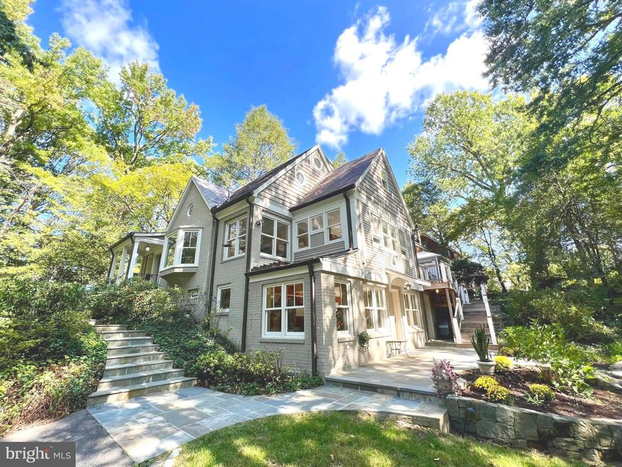 Situated on a magnificent home-site (with two lots/parcels included totaling 15,243 sq. ft.), overlooking the park, this custom brick beauty has all sorts of surprises to delight the most discerning buyer. The original home has been remodeled and expanded with only the finest finishes and is flooded with natural light. The lower level expansion includes a level walkout to a vast patio and raised flower beds, has full size windows, a separate entrance, gym, full bathroom with a clawfoot tub, recreation room, multipurpose/5th bedroom, a finished laundry room, built-ins and a masonry wood burning fireplace. The expansion also encompasses the main level, with a sumptuous owner’s retreat and sitting room, an elegant ensuite, nine foot ceilings, and French doors leading to a very private deck overlooking expansive gardens, patios, and a whimsical tree house for the children (or for the child inside the adults). The upper level is just spectacular and features soaring ceilings, architecturally significant and unique windows, walk-in closets, oodles of storage space, a cedar closet for storing winter clothes and hardwood floors. The main level boasts large, elegant reception and dining rooms, a sunlit breakfast room with amazing views of the surrounding woods and currently has access to bird feeders, which are perfect for the ornithologist enjoying morning coffee while birdwatching.  Each level allows for a flexible floor plan to satisfy any new owner’s needs and is also ideal for multi-generational living as there are two main entrances and one that is level.  A long meandering driveway borders a lovely, wooded walking path and the sights and sounds of nature can be enjoyed from every vantage point. An easy stroll to Zinnia's for your morning coffee, lunch or dinner and also a short stroll to parks, walking trails, Metro, downtown Silver Spring and so much more!  The thought and care that went into the finer details cannot be overstated. A gardener, entertainers, commuters, and birdwatchers delight - this amazing home has it all! Welcome home!