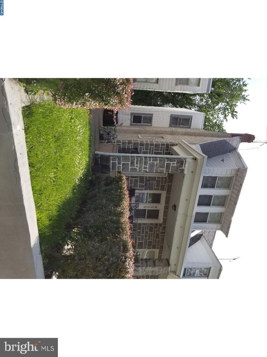 Beautiful large twin on a tree-lined street. New kitchen, new carpets, all large rooms, newly painted, nice front lawn with open concrete porch. Basement completely remodeled walls all new drywall, glass block windows, new carpets-being used as a master bedroom with access to rear, laundry area. Kitchen has recessed lights, countertop with bar stools dividing kitchen from dining room. Dining room has the mirror on the wall with a nice chandelier.