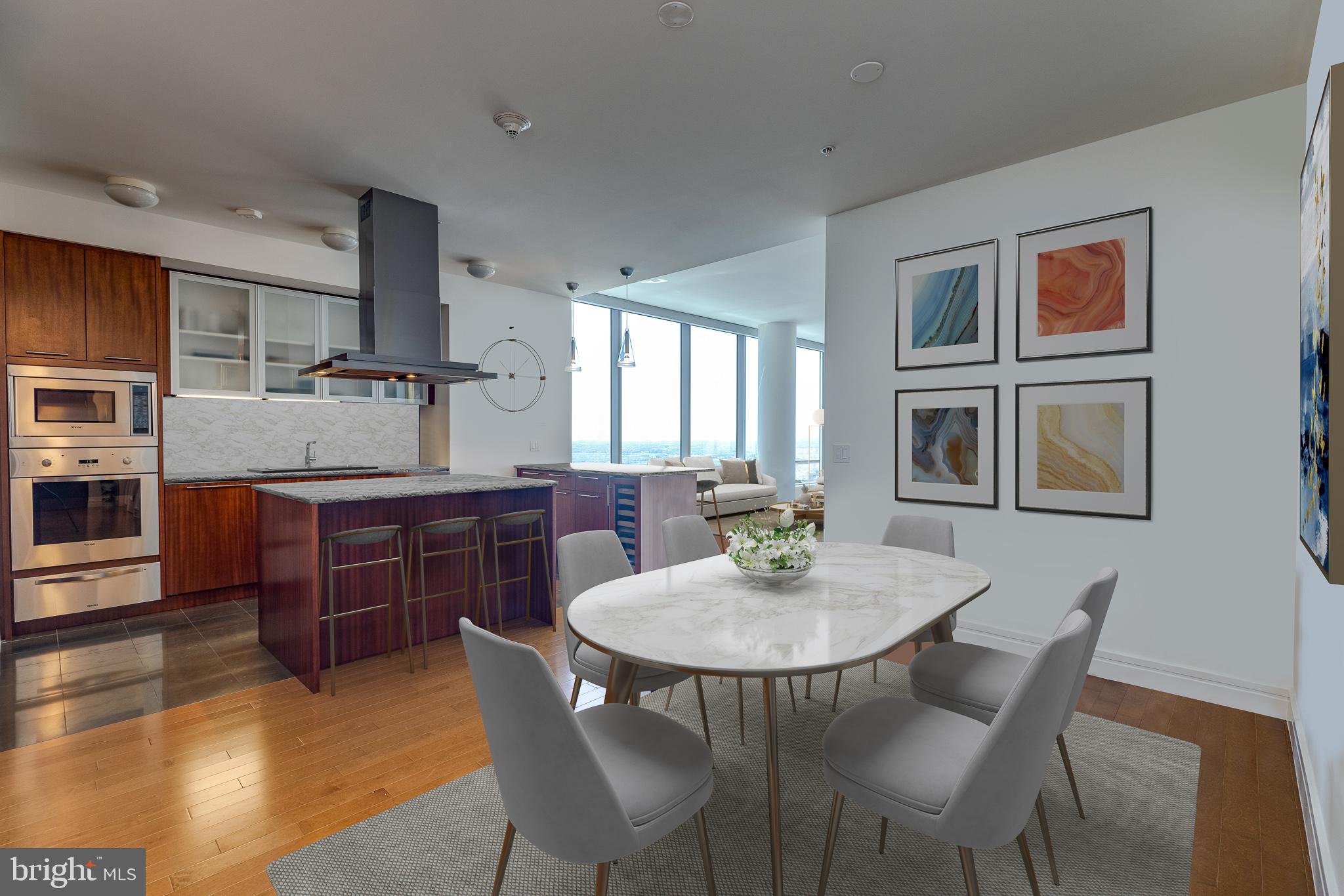 Includes 1 Car Parking! Residence 42G is one of the highest corner combos in the building, which offers some of the most incredible sunset and city views you won't find anywhere else. Featuring brand new countertops and backsplash, this 2,356 square foot, 3 bedrooms, 3.5 bathrooms is ready for immediate move-in. The gourmet designer kitchen features Sefina cabinetry, Viking built-in gas cooking and microwave, Sub-Zero refrigerator, Miele dishwasher, Uline wine cooler, Dornbracht fixtures, Franke stainless steel under-mount sink, and offers island seating and is open to both the living and dining areas.
The best in Location, luxury brand, amenities, white-glove services, iconic unobstructed views, high-end designer finishes, and a lifestyle second to none! Floor to ceiling operable windows in every room (a unique feature in Center City), soaring ceilings, gorgeous hardwood floors.
The luxurious master bath features Calacatta marble floors, countertops, double vessel sinks, Bain ultra-soaking tub, Duravit commodes, separate stall shower with a frameless glass enclosure. Powder room with Calacatta marble floors, pedestal sink, and Duravit commode. Bosch washer and dryer.
It is the most premiere white-glove full-service building Philadelphia has to offer in Center City living. Live in one of the world's most iconic brands, world-class staff, and white-glove services, all in a superior location where you can get out of the city in minutes. From this exceptional home, you will have an unobstructed sunset view and the evolving Philadelphia skyline.
Among the many world-class amenities, there are two chauffeured-resident house cars, a Mercedes S 560 and a Cadillac Escalade. The state-of-the-art fitness facility overlooks City Hall and Dilworth Park, indoor pool, locker rooms, private Yoga room, hot tub, a brand new Resident Lounge with outdoor area, and unbelievable Theater Room.
The Ritz is a pet-friendly building with an on-site dog run. Parking available in the on-site, underground garage. In addition to private services and amenities only available to residents, you may also enjoy in-residence dining from the adjacent Ritz-Carlton Hotel, restaurant, spa services, and more!