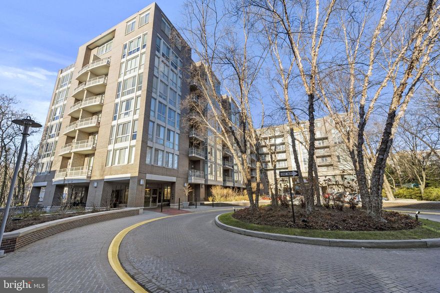 Stunning Condo in the heart of Falls Church. Unit 407 is 1,536 square feet and has 2 large bedrooms with separate baths, an office/den with built-in desk and shelving, powder room and gourmet kitchen. This unit is all about storage and built-ins in closets, in bedroom #2 and in large pantry. The kitchen cabinets have been upgraded with roll-out shelves. There is hardwood flooring throughout, custom Hunter-Douglas window treatments and many large closets with custom built-ins. Brand new air conditioning unit (2023). The unit is drenched in natural light, thanks to the floor-to-ceiling windows. You will enjoy the atmosphere and convenience of the electric fireplace. Enjoy quiet mornings on your balcony with beautiful views of the park and trees. You have two reserved parking spaces (couple of steps off the elevator) and a storage room in the garage. Brand new HVAC (2023). The Byron features a fitness center, party room, library, conference room, elevator and garage parking. It is located near local parks, shopping and restaurants. This is a beautifully maintained condo and a must-see!