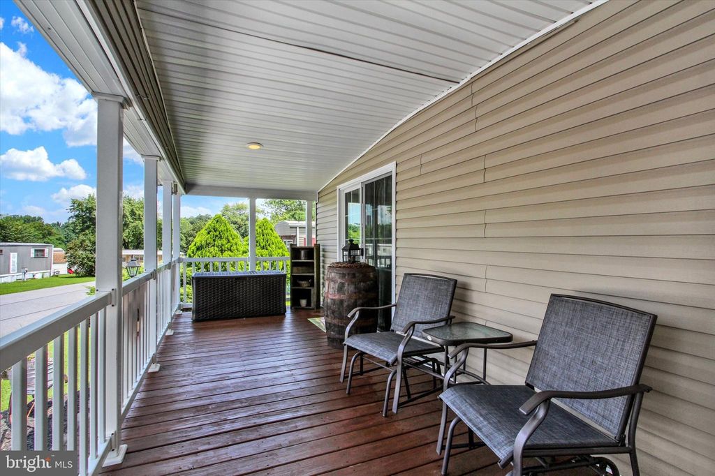 Photo of 717 Lake Drive, MOUNT WOLF, PA 17347 (MLS # PAYK2087066)
