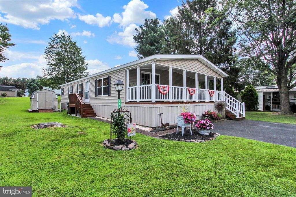 Photo of 717 Lake Drive, MOUNT WOLF, PA 17347 (MLS # PAYK2087066)