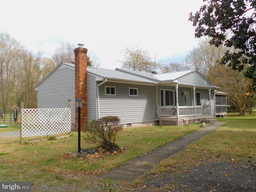 Price Reduced for Easy Sale - Three bedroom, two bath house on 2+ acres of rural bliss.  Short commute to Dahlgren, King George and Colonial Beach. Easy drive to Fredericksburg and the VRE. Plenty of room for a garden and pets. Showings are arranged by appointment with the listing agent.