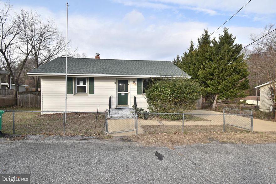 Quaint 2 bedroom rambler with good size fenced rear yard.  Interior features include hardwood floors and ceiling fans.  Ideally located close to Andrews Air Force Base with abundant shopping and restaurants nearby.  Sold in AS IS condition.