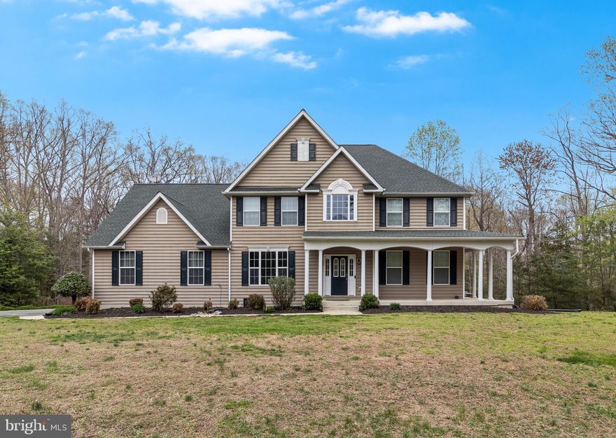 Welcome to 12856 Tawny Acres Place, a beautiful property tucked away in one of La Plata’s most desirable locations on 5.8 acres! This well maintained home offers a perfect blend of comfort, space, and privacy – ideal for both relaxing and entertaining. From the moment you arrive, you'll be captivated by the property's serene setting, spacious yard, and inviting curb appeal. Inside, enjoy a well-designed, open floor plan, filled with natural light and generous living spaces. As you step through the front door, you are greeted by a stunning two-story grand foyer, complete with an open staircase, crown molding, hardwood floors, and 9 ft ceilings throughout the main level. Upstairs, the massive master suite offers a huge walk-in closet, bathroom with his and her vanities, and oversized tub with heated backrests. Flooring throughout the second floor upgraded in 2023. The full walkout basement offers a blank slate for you to make the space your own. Rough in allows for an additional full bathroom and large windows to support extra bedrooms- still leaving room for more storage, home theatre, gym, man cave, home office...the possibilities are endless! Car enthusiasts and hobbyists will love the oversized three-car garage, which features an upgraded 10.5' x 18' custom garage door—perfect for larger vehicles, boats, or workshop access. Some other upgrades include - new roof (2021) and 2 dual zone heat pumps (2014 & 2018). This home was custom built by LITZ custom homes but comes without the new construction price tag and NO SCHOOL EXCISE TAX saving you thousands of dollars over the next 10 years! Do not miss out on this opportunity to own in highly sought after Dentsville, MD - schedule your tour today!