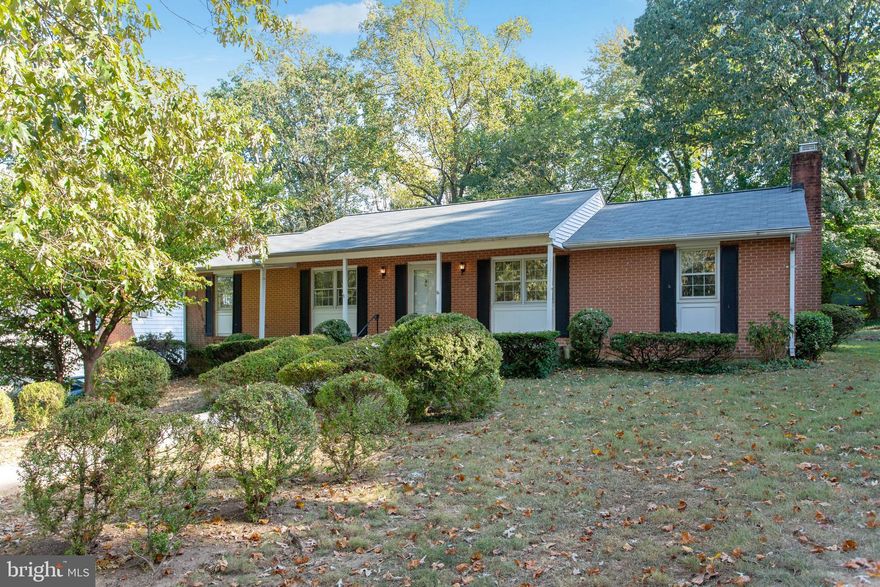 Over 1/2 an acre of wooded tranquility. This home offers the quaintness of small town living while maintaining privacy. Beautiful, well maintained hardwood floors throughout main level. Three bedrooms including a master complete with full master bath. Fourth bedroom in lower level; also complete with full bath. More than ample living space on main level complete with formal living room, dining room, kitchen, family room with fireplace, and sunroom offering a wood burning stove. This property has been well loved over the years by the original owners and their family. Awaiting your finishing touches and new memories made. Imagine the holidays spent in your new home. NEW ROOF August 2019 with 25 year transferable warranty to new owners.