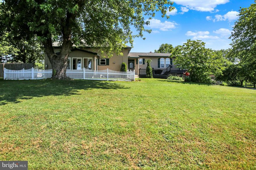 🏡 Welcome to 55 Groff Road! Nestled on a 1.06-acre corner lot, this beautifully renovated 3-bedroom, 2-bath rancher offers a perfect blend of character and modern convenience. Originally built in 1959 and thoughtfully updated in 2002, this home boasts hardwood floors throughout, an open-concept kitchen, dining, and living area, and a cozy wood stove in the basement. The sunroom is ideal for morning coffee, while the spacious family room—complete with its own full bath—could serve as an in-law suite. Step outside to enjoy the covered wood deck, perfect for entertaining! With an oversized two-car garage, ample off-street parking, and multiple storage areas, this property is as practical as it is inviting. Located in a peaceful country setting, yet close to amenities, this home is a must-see! Schedule your showing today!