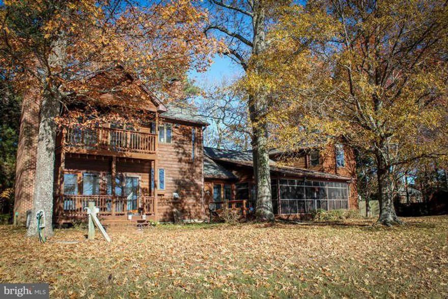 LEONARDTOWN LOCATION!!!   Well   Well      Built Contemporary in nice area on the Potomac River. Stunning SUNSETS!!! 5 bedrooms.  Pier with water and boat lift. nice hardwood floors.  Big Kitchen  .Screened Porch   1 car garage plus carport.   2 Fireplaces. possible owner financing