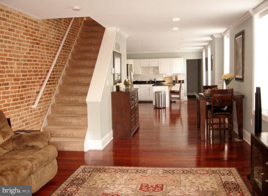 Great space! Perfect for roommates with 2 Master  bedroom suites both with en suite baths and large closets. Freshly carpeted full finished basement with full bath, completely waterproofed.. Light, bright and spacious end of group town home in the heart of Canton. Huge gourmet kitchen with island, ss appliances and granite counters. Hardwood floors on main level. Potential parking pad.