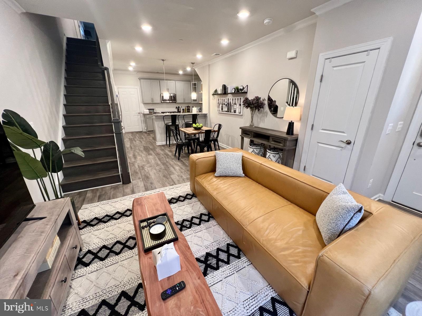 Welcome to this stunning 3-bedroom, 2.5-bath townhome-style condo in the vibrant Kincora community. This spacious two-level home features a one-car garage, open-concept living, and elegant finishes throughout. Enjoy a gourmet kitchen with granite countertops, stainless steel appliances, and a large island perfect for entertaining. The primary suite offers a tray ceiling, walk-in closet, private balcony, and a luxurious bath with dual vanities. Convenient upper-level laundry, LVP flooring, and smart home features complete this beautiful home. Water and Sewer covered as part of rent. Minutes from One Loudoun, Top Golf, and major commuter routes. Smoking is not allowed. Pets are allowed on a case by case basis. Available to occupy immediately.