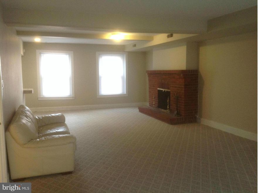 Mt. Vernon bi-level top floor walk up.  This spacious 2 bedroom apartment features a wood-burning fireplace, large terrace with grill for entertaining and relaxing, in-unit washer/dryer, walk-in closets, security system, Central AC.  Close to restaurants, shopping, cultural events, institutions, hospitals, Downtown, major highways. Sq. footage listed is building total.