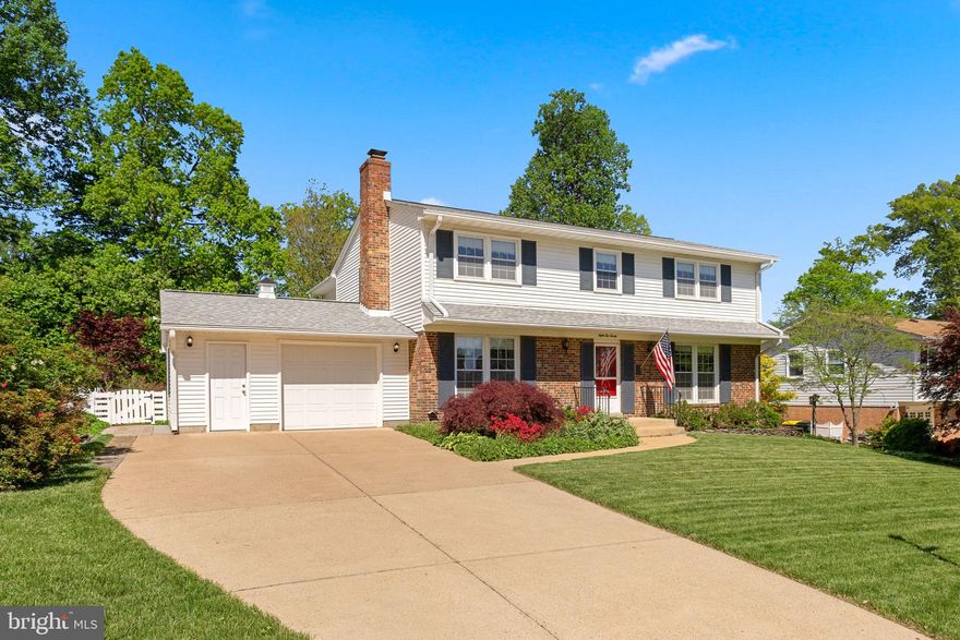 Deceptively spacious, this beautifully maintained Colonial offers over 4,000 square feet of living space, including a substantial two-story rear addition. The heart of the home is the impressive 480-square-foot chef’s kitchen, featuring over 50 American Craftsman cabinets with convenient pull-out drawers, a walk-in pantry, a large eat-in area, and ample space to add multiple islands—ideal for cooking, hosting, and everyday living.

The family room, located just off the kitchen, offers ample space for both relaxing in front of the TV and enjoying a board game night. A large picture window fills the room with natural light and provides a beautiful view of the landscaped backyard—making it the perfect space for everyday living and entertaining."

Step into the bright and airy sunroom, where vaulted ceilings and panoramic views of the yard create the perfect backdrop for family dinners or morning coffee.

Outside, the professionally landscaped and meticulously maintained yard offers a private, fenced-in retreat. Entertain with ease on multiple patios, follow the elegant slate paver walking path, and enjoy the practicality of an oversized storage shed. The in-ground sprinkler system ensures easy upkeep all season long.

Upstairs, you’ll find five generously sized bedrooms, each with gleaming hardwood floors, and three full bathrooms. The spacious primary suite includes his-and-her walk-in closets and a large en-suite bath with ample room to add a double vanity and oversized shower, offering the potential to create a luxurious spa-like retreat.

A charming library with a brick fireplace adds character and warmth, making it an ideal space for a home office, reading room, or dedicated homework area.

The finished lower level offers endless possibilities, including a large recreation room, a full bath, a potential sixth bedroom, a utility room, plus a dedicated workshop. A dry, lined, and vented crawl space provides even more storage options, while a convenient walk-up stairwell offers direct access to the backyard.

Additional features;  expanded 1 1/2 car garage with plenty of storage, new CertainTeed Landmark shingle roof 2021, new main HVAC with smart thermostat 2024, windows replaced, upgraded 200 amp electrical service, exterior wood wrapped for easy no-maintenance living, LeafGuard gutter covers,  spa-like jetted tub in one of the upstairs bathrooms and so much more.

Located in sought-after West Springfield, this home provides unmatched convenience with easy access to the Fairfax County Parkway, VRE station, Springfield Metro, commuter lots, bus stops, Fort Belvoir, the Pentagon, and Washington, D.C. The community is nestled beside the Springfield Golf & Country Club and close to local amenities including community pools, Hidden Pond Nature Center, and several shopping centers.