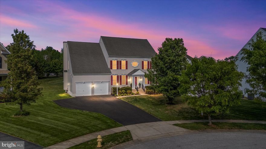 Welcome to this stunning Koch Home “Andover” model, situated on a private 0.35-acre lot. This meticulously maintained colonial offers 4 bedrooms, 3.5 bathrooms, and 3,211 square feet of finished living space.
The main level features a welcoming flow, anchored by an open-concept kitchen equipped with a large center island, and granite countertops. This area seamlessly connects to a bright breakfast area and family room, the perfect space for entertaining. A formal dining room, elegant flooring, and a cozy fireplace add warmth and sophistication to the home’s interior.

Retreat to the primary suite, which offers a private escape complete with a spacious walk-in closet and a luxurious en-suite bath. The home provides a versatile floor plan with ample space for a dedicated home office, recreation room, or media area. Step outside to enjoy the Trex-deck patio which overlooks a private, tree-lined yard, an ideal spot for morning coffee or evening relaxation.

Additional highlights include a two-car garage and easy access to local amenities and scenic trails. To visit, take Riva Rd. to one mile south of the Riva Bridge, then turn left onto Anglesey Dr., located between the Waterford and Cambria communities. This home combines timeless colonial charm with modern comfort in a highly sought-after location.