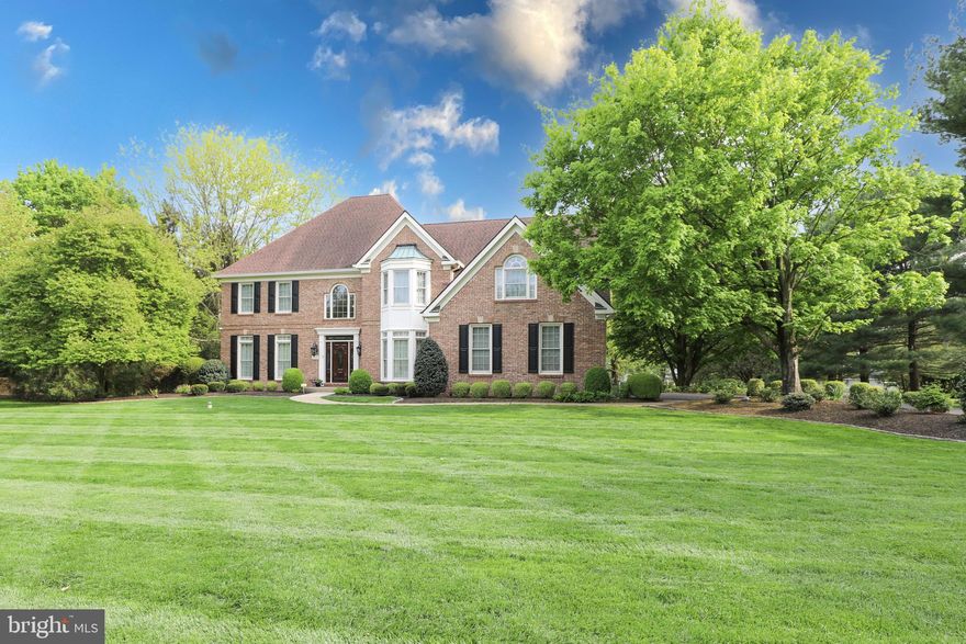 ATTENTION TO EVERY DETAIL will be your first thought as soon as you arrive at 1595 Ginko Lane's manicured setting. This CUSTOM built home by David Schrenk was the showcase home in this highly sought after community of Willow Wisp Farm. Each room has it's own personality with designer's elements and custom millwork.  As you enter the 2-story Foyer please note all the architectural characteristics: tray ceilings, transom windows, chair rail trim, crafted mill work and solid oak flooring. The sun-filled living room with floor-to-ceiling windows, custom trim and oak flooring is the perfect place for formal entertaining.  The dining room elegantly formal but ready for the guests to feel at home. Note the floor-to-ceiling bay windows, wainscotting and multidimentional tray ceiling. Entertaining is an art and the Butler's pantry with solid cherry French pocket doors and unique craftman archway separating the formal dining area to the kitchen gives a more intimate and private setting.  Note the granite countertop at the coffee bar and under cabinet lighting.   An epicurian kitchen describes the center of this home.  All rooms lead to the kitchen- -the heart of this sumptuous home. Morning coffee to a late night snack all to be enjoyed and prepared in this wonderfully designed Signature renovated kitchen with upgrades too many to mention: timeless cherry cabinets, pull out pantires, twin spice towers, SubZero built-in refrigerator, dual Wolf 6 burner range with gas cooktop, griddle and two gas ovens, industrial exhaust fan, a nine foot granite island with pendant lighting, inserted microwave and Blanco double sink and lighted display shelving, This kitchen will delight an executive chef and the..... I love to be in the kitchen individual!!! The adjacent breakfast area is also the Heart of the Home.  Calming views of the outside manicured landscape and deck area will add to any meal along with the warmth from the newly replaced Italian hand-painted fireplace.  Also note, the built-in desk and storage area with detractable doors for all your organized paperwork. Time to relax and enjoy a good book or watch sports on TV? The vaulted two-story family room with new carpeting, exposed wood beam ceiling and floor-to-ceiling Fieldstone fireplace surrounded by integrated cabinetry is the perfect place. Enjoy your pirvate time or converse with the folks on the deck thru the wall of full length windows and sliding glass door.  As you enter the stately library or study you will automatically notice how well designed this room is for all your work tasks.  Unique built-in timeless cherry cabinets with many file drawers, cherry desk and well-crafted coffered ceiling with recessed lighting will be enhanced by streams of sunlight through the floor-to-ceiling bay windows. Newly renovated powder and laundry rooms completes the first floor. Two separate staircases will take you to the second floor with all new carpeting. The grand master's quarters boasts tray ceiling, wainscotting trim work and lighted ceiling fan. The en suite master bath spells  l u x u r y !!! Relax in the marble surround hydrotherapy control tub or de-stress in the dual all frameless glass shower with mosaic tiles. The oversized master's walk-in closet gets a true 10 for all your wardrobe needs. Bedrooms two and three have new installed closet systems, tray ceilings, lighted ceiling fans and share a split full bath. The secondary staircase from the family room also leads you to the guest suite.  This special fourth bedroom is complete with cathedral ceiling, palladium window, multidimentional crown molding, two walk-in closets with new wardrobe systems and an en suite full bath with linen closet, make-up vanity and tile flooring. The finished basement with new carpeting has a theatre, half bath, game room plus ample storage area.  All this plus a three car garage and whole house generator.  Come see  for yourself... this is the perfect place to call HOME!!!