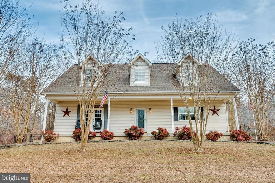 Large and Gorgeous 4BR/3.5BA, custom built home with upgrades galore and incredible outdoor space. Situated upon a nearly 4 acre wooded lot, serenity awaits. Original owners; lovingly and meticulously maintained, freshly painted. Beautiful hardwood flooring throughout and large windows with tree views frame the generous layout. The large living room has plenty of room for furniture placement and French doors leading to the front porch. Prepare meals in the beautiful eat-in kitchen where generous custom cabinetry and Corian countertops provide ample storage and prep space including a breakfast bar and island. Adjoining the kitchen is the formal dining room. The cozy sunroom has a wood burning stove and is flooded with natural light from two sets of French doors. The peaceful owner's suite has a grand layout with hardwood flooring and sitting area. The very large tiled en suite bath boasts an over-sized tiled shower, and walk-in closet. Main level Laundry Room with cabinetry. Half bath in hallway. Upstairs are three additional spacious bedrooms with great storage, and a hall bath, completing the impressive top level. The lower level offers flexibility with a large open recreation/family room, full bath, guest room, hobby room, office, workshop, a rough-in for a kitchenette and a huge storage room with built-in shelving. The lower-level French Doors open to the large side yard and stairs to access the pool deck making this home’s layout an entertainer’s dream. Enjoy all the outdoor living spaces whether by the in-ground pool area surrounded by beautiful landscaping and secured iron fencing, sitting on the paved stone patio, or relaxing on the expansive front porch all surrounded by lawn and mature forest. Oversized, deep, side-load two-car garage with additional rear door access. Quiet street, no through traffic.  Commuting distance from DC, National Harbor, Joint Base Andrews, Bowling AFB, PAX River, NSWC IHD and Pentagon. Close to shopping, restaurants, entertainment and parks.