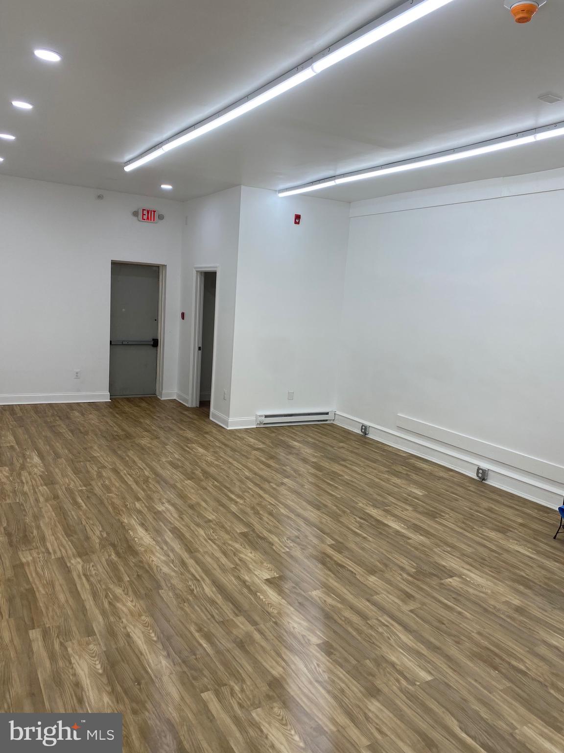Prime opportunity to own a versatile mixed-use building featuring a vacant commercial storefront on the ground level and a tenant-occupied 2-bedroom apartment upstairs. This well-located property offers great visibility and foot traffic, making it ideal for a variety of business uses including retail, office, or service-oriented ventures.
Ground Floor: Spacious commercial unit with open layout, private restroom, and rear access. Ready for customization to suit your business needs.
Second Floor: Bright and well-maintained 2-bedroom, 1-bath apartment with separate entrance. Currently rented for $1200 monthly, providing immediate income potential.
This property is in a prime location with ease of access to public’s transportation, major highways, and shopping.