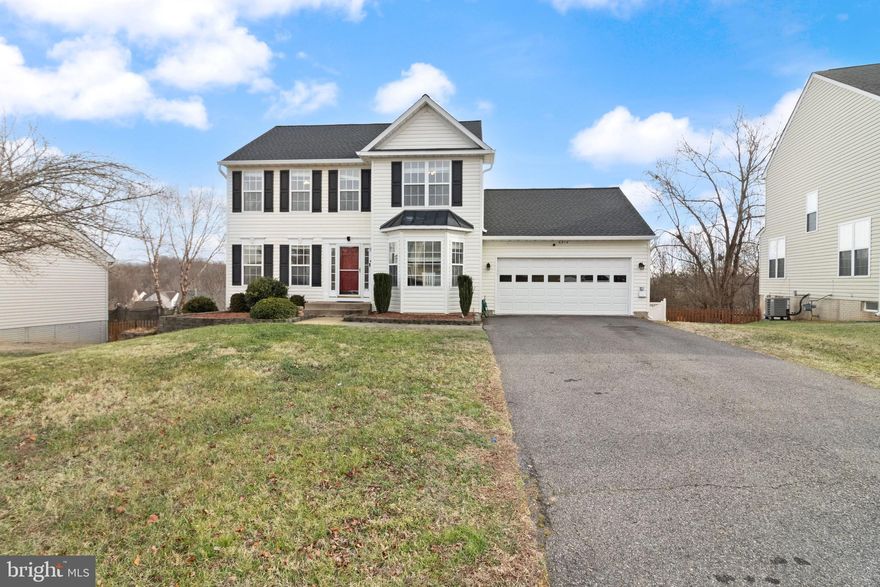 Welcome home to 6914 Versailles Dr, located in the desirable Salem Fields community of Fredericksburg, VA. This spacious home offers 5 bedrooms and 3.5 bathrooms across three finished levels, thoughtfully designed for comfort and flexibility.
The upper level features a generous primary en suite with vaulted ceilings, walk-in closet, soaking tub, dual-sink vanity, and separate shower, plus three additional bedrooms and a full hall bath.
The main level is ideal for entertaining with a powder room, private study with glass French doors, formal dining room with bay window, and an open-concept eat-in kitchen that flows into the large living room with a cozy gas fireplace. Step outside to the deck with pergola (2023) overlooking the fully fenced backyard.
The finished basement includes a second family room, fifth bedroom, and full bathroom—perfect for guests—along with sliding glass doors leading to a stamped concrete patio (2019) and spacious yard with retaining wall.
Recent updates provide peace of mind, including a new roof and gutters (2025), hot water heater (2026), HVAC (2023), new carpet and fresh paint throughout (2026), fencing (2023), and deck (2023). The basement was remodeled in 2016, and appliances were updated in 2016. Additional features include granite countertops, modern fixtures, ample storage, a 2-car garage, and a long driveway with plenty of parking.
Salem Fields offers pools, playgrounds, trails, and a clubhouse, all conveniently located near shopping, dining, and commuter routes.