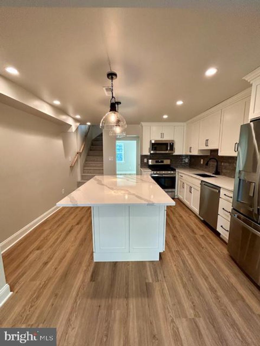 Welcome to 121 Maple, where comfort meets convenience in the heart of Conshohocken. This beautifully updated home has been thoughtfully renovated with meticulous attention to detail.

The kitchen features a spacious island, ample cabinet storage, and modern stainless steel appliances, including a dishwasher and wine fridge. Just off the kitchen, a versatile room can be used as a dining area, extra living space, or a home office. Down the hall, the living room is bathed in natural light, creating a warm and inviting atmosphere. A half bath completes this level.

Upstairs, the primary bedroom boasts an en suite bathroom and a walk-in closet. The second bedroom, a full hall bathroom, and a convenient laundry room are also on this floor. The third level offers a private third bedroom.

Additional features include vinyl flooring throughout, central A/C, and efficient gas heating. For added security, there is an exterior camera.

The rear yard is perfect for relaxing, entertaining, or providing a space for your furry friend to enjoy. The backyard is private & comes with a private patio area as well, making it the perfect space for grilling with friends or to relax and read. 

Parking is hassle-free with an assigned parking spot located right out front, ensuring easy and convenient access to your home.

Enjoy the best restaurants, bars, and shops that Conshohocken has to offer. Walking distance to the train station for an easy commute to the city and conveniently located near major highways.

Pets welcome! Available 6/01 - Schedule your showing today!