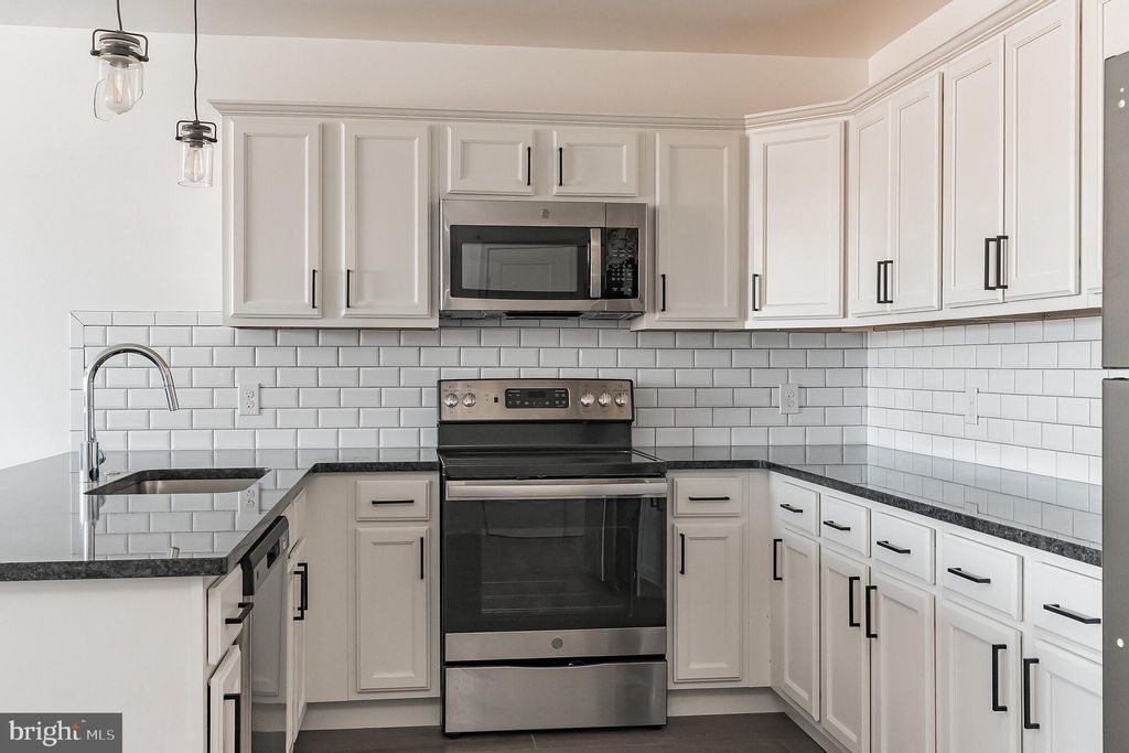 Photo of 6649 Ridge Avenue #A120, PHILADELPHIA, PA 19128 (MLS # PAPH2573120)