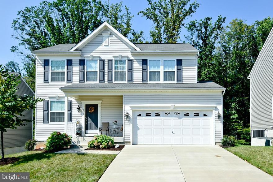 Beautiful 4yr young home! Ready for new owners. Open Great Room for Living Dining, Kitchen. High-End Custom Finishes: custom closets, crown molding, stone fireplace & hrdwd floors on main level, stone tile backsplash, upgraded kitchen cabinets, all lighting upgraded, faucets upgraded. 12x13 Screen Deck w/fan off kitchen, stone paver patio,Finished basement with slider to lovely landscaped yard.