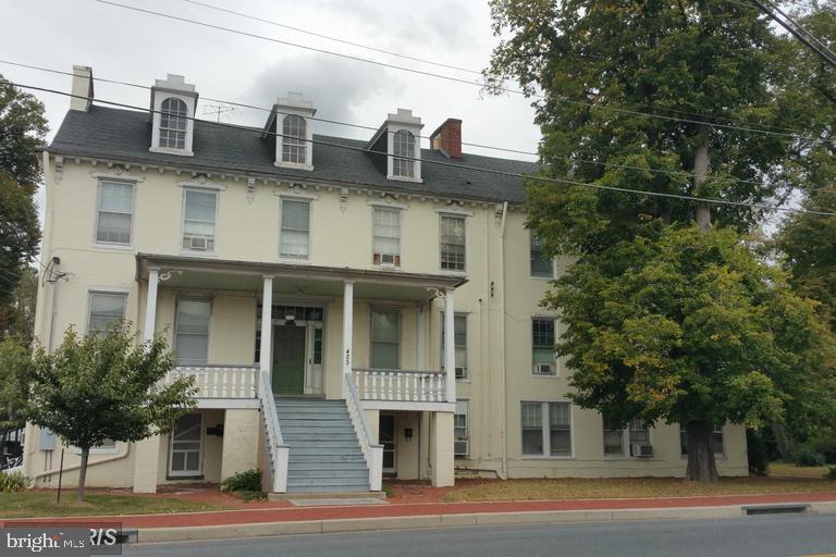 Historic building in downtown Fredrick. . Living room 8x11. Bedroom 11x11 with Large closet. AC in 2 windows. Roomy bathroom. ALL UTILITIES PAID. Tenant pays wi-fi and cable. Bathroom has bathtub and shower with vanity.. Application fee includes background check and credit check. Downtown area close to Fairgrounds. NO SMOKING building. Free Parking off street. Laundry onsite. Rent includes all utilities excepting cable/wifi.