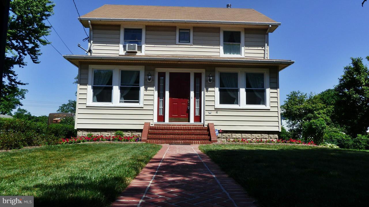 Traditional updated Craftsman home with multiple living arrangement possibilities. Master with full bath on main level, could very well be 6 bedrooms if needed. Lush fenced yard with over .25 acre inc.add. lot. Driveway with full 2 car garage to store your vehicles while walking to catch MARC train for your commute. Full sun porch, side entrance and foyer, separate dining and eat in kitchen.
