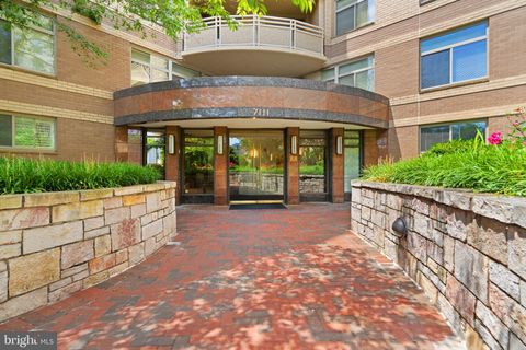 Photo of 7111 WOODMONT AVE #918, CHEVY CHASE, MD 20815 (MLS # MDMC2093314)