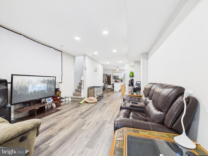 Welcome to 1526 N Patterson Park Ave—an updated 3BR/3BA townhome offering a bright open layout, modern finishes, and charm you don’t see every day. The main level features a seamless open-concept flow from the living and dining areas into the kitchen, complete with a center island, quartz countertops, and stainless steel appliances including a gas range, built in microwave, dishwasher, and refrigerator. Contemporary lighting and unique details like stained-glass accents add personality and warmth.

Upstairs you’ll find two spacious bedrooms, including a primary suite with a full en-suite bath, plus a generously sized second bedroom. Two skylights flood the home with natural light. The finished lower level provides a flexible third bedroom, full bath, laundry area, and additional storage—ideal for guests, a home office, or extra living space.

Enjoy year-round comfort with central air and gas forced-air heat, and step outside to a rear deck with a privacy fence—perfect for grilling, relaxing, or hosting friends.

Convenient to Johns Hopkins, Northeast Market, and local dining with continued development and momentum throughout the area. Sold strictly AS-IS (home is in good condition). Ask about potential Baltimore City and Maryland homebuyer grant/incentive programs available to qualified buyers. Schedule your showing today!