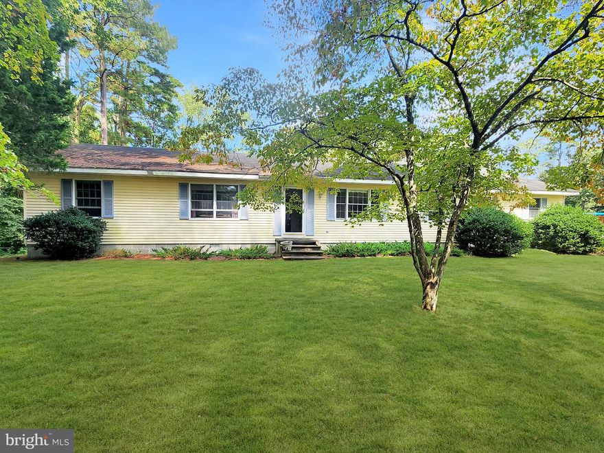 Well-maintained ranch home on a large lot just outside of Snow Hill city limits. 3875 W. Hills Drive is situated on a 3/4 mostly cleared lot. This home is ready for someone to make it their own. The interior features a spacious semi-open floor plan. The front offers a large living room, which is open to the formal dining area. On the rear of the house is the kitchen, which is open to a large family room that includes a pellet stove for cozy winter nights. From the family room, you'll step out to a nice 3-seasons room overlooking your private backyard. The primary bedroom is spacious and includes an en-suite bath. There are two more large bedrooms and a full bathroom off the hallway.  Schedule your appointment to view this home today.