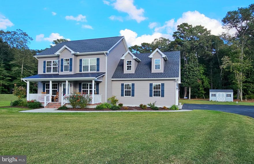 Welcome to 9305 Samford Court, a beautifully maintained one owner home built in 2021 by Malone Homes, perfectly set on a premium 1.53-acre cul-de-sac lot in the sought-after Layfield Woods neighborhood. With nearly 2,180 square feet of living space, this 4-bedroom, 2.5-bath home offers the ideal blend of modern craftsmanship, privacy, and convenience. Step onto the welcoming covered front porch and into an inviting open-concept layout filled with natural light and stylish finishes. The living room centers around a cozy gas fireplace, creating a warm and comfortable atmosphere for gatherings. The kitchen features white shaker cabinetry, granite countertops, stainless steel appliances, and timeless design details that make it both functional and elegant. Custom blinds, quality materials, and thoughtful touches are found throughout the home. The spacious primary suite provides a relaxing retreat with a beautifully appointed en-suite bath, while three additional bedrooms offer space for family, guests, or a home office. A two-car garage and oversized paved driveway ensure ample parking and storage options. Enjoy outdoor living on the expansive, oversized deck, surrounded by well-manicured landscaping and serene wooded views with no neighbors to the side or rear. The storage shed adds convenience for tools and lawn equipment, while the two-tier water softener system with iron and sulfur removal ensures pristine water quality. Located just minutes from Delmar’s highly rated schools, tax-free shopping, and a variety of restaurants, this property combines rural tranquility with modern convenience. Whether hosting summer barbecues, relaxing by the fireplace, or enjoying the peaceful setting, this home offers a lifestyle that’s both comfortable and refined.