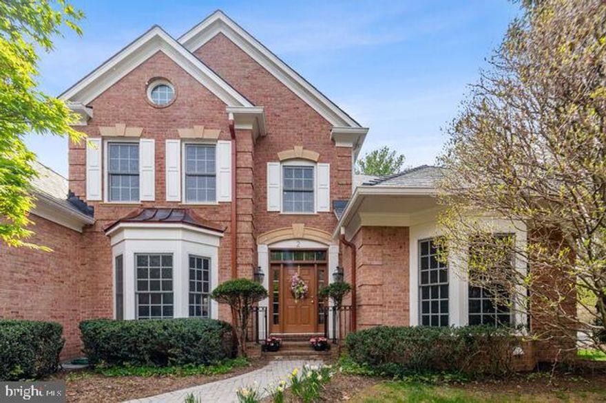 Elegant Avenel living with Main-Level Primary bedroom suite & luxury marble bathroom.  Additional 3 bedrooms upper level. Unique 2-home open courtyard on corner lot with partial view of golf 17th & 18th holes.  This sun-filled home features a beautiful entryway leading to a Grand great room. Bright lower level with exercise room and walk-out to patio.  Fifth bedroom & full bath.  Spacious entertainment room with bar area.  Plenty of storage space.   Additional Trees can be added along the perimeter of the property for more privacy with HOA approval.   Home is Vacant.  Several rooms virtually staged.  Enjoy Avenel living and the amenities of nearby Potomac Village, Cabin John, C&O Canal, and so much more.  Avenel Community Tour Link attached.