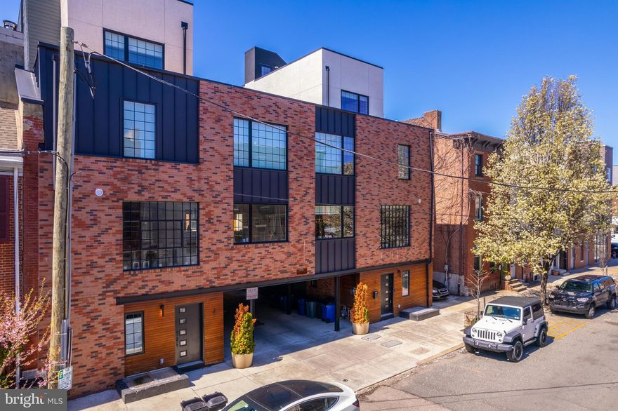 Welcome to 1130 Shackamaxon #5 in the sought-after "Shack 8" community! This stunning residence offers a spacious 2-car garage and showcases top-tier craftsmanship from finished basement to rooftop. Built in 2017 by Kassis Ventures, it sets the standard for both quality and modern design. Nestled on a quiet block, Shack 8 combines privacy with convenience, putting you steps from the vibrant Girard and Frankford Avenue commercial corridor in the heart of Fishtown. With its unbeatable location and exceptional construction, this home is truly a rare find!