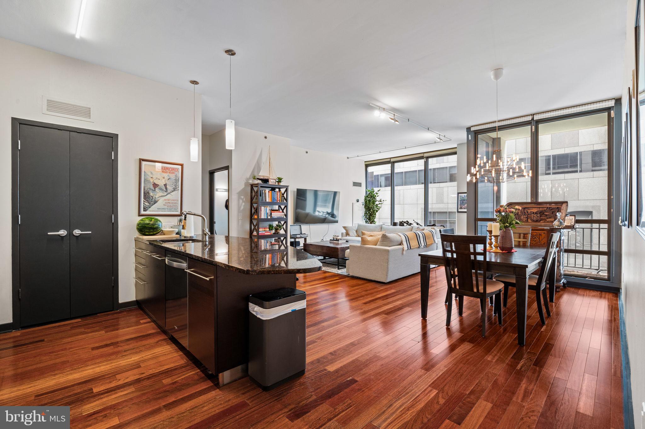 2101 Market Street, Unit 307 | The Murano | Philadelphia, PA 19103 Welcome to Unit 307 at The Murano, where modern luxury meets dramatic scale in one of Philadelphia’s premier residential towers. This two-bedroom, two-full-bath residence showcases soaring 11-foot ceilings, creating an open, loft-like feel with exceptional natural light streaming through floor-to-ceiling windows. The thoughtfully designed floor plan features a sleek, open-concept kitchen with granite countertops, stainless steel appliances, and an oversized breakfast bar, perfect for entertaining or casual dining. The spacious living and dining areas flow seamlessly, offering versatility and comfort. Both bedrooms are generously sized with massive closet space, including a true primary suite with a spa-like bath featuring a soaking tub, frameless glass shower, and double vanity. A second full bathroom with upscale finishes serves guests or a second bedroom/office with ease. Additional highlights include: In-unit washer and dryer Hardwood floors, Central air, assigned parking space, Dedicated storage unit
Residents at The Murano enjoy access to:
24-hour concierge
Indoor heated lap pool
State-of-the-art fitness center
Landscaped sun deck
Hospitality suite for guests
Secure access and building amenities
Situated just steps from Trader Joe’s, Rittenhouse Square, 30th Street Station, and the Schuylkill River Trail, this residence offers the perfect combination of style, convenience, and lifestyle.
Don’t miss your opportunity to own this rare, oversized unit with parking, storage, and incredible ceiling height—schedule your private showing today!
