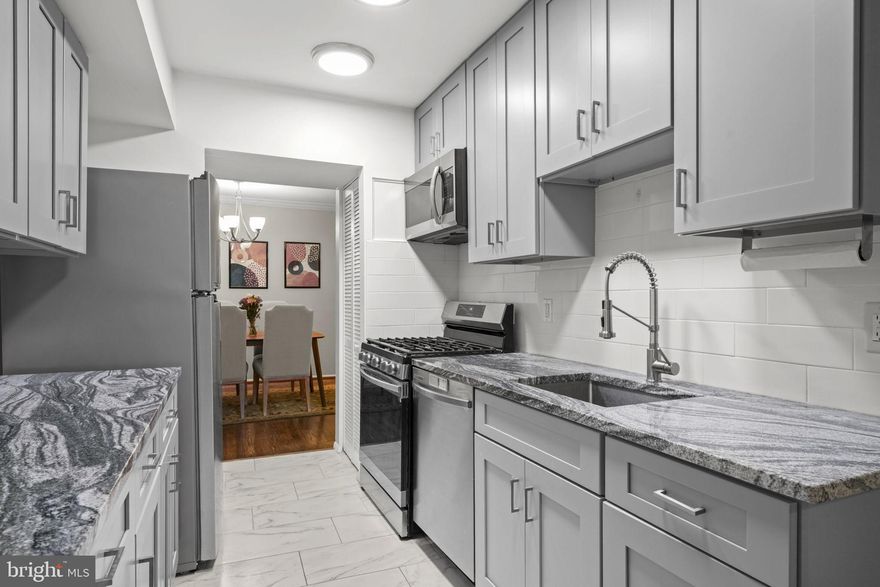 Welcome to Cherry Glen Condominiums, a sought-after community in the heart of Beltsville offering convenience, comfort, and beautifully updated living.  Step inside and immediately feel at home in this fully renovated condo featuring three spacious bedrooms and two stylish full bathrooms. The primary suite is a true retreat with two walk-in closets. Both bathrooms have been thoughtfully updated with modern vanities, sleek ceramic tile flooring, new bathtubs, updated lighting, mirrors, and fixtures.  The kitchen is designed to impress, featuring stainless steel appliances including a built-in microwave, gas range with Wi-Fi and bread proofing options, dishwasher, and refrigerator. High-end granite countertops, a classic subway tile backsplash, soft-close cabinetry, and easy-to-maintain ceramic flooring bring both function and style together seamlessly. Just off the kitchen, a versatile bonus space and a large patio door provide additional flexibility and natural light.  Enjoy peaceful views and a touch of nature right from your private balcony. Inside, warm hardwood floors flow throughout the separate living and dining areas, creating an inviting space that is perfect for both everyday living and entertaining. The dining room is highlighted by updated lighting and elegant floor-to-ceiling mirrors that enhance the space.  Convenience continues with an in-unit full-size LG washer and dryer, along with an updated heating and cooling system to keep you comfortable year-round.  Ideally located just minutes from I-495 and I-95, as well as the College Park and Greenbelt Metro stations, commuting is a breeze. Metro bus stops are also conveniently located right outside the community entrance  .This move-in ready home offers the perfect blend of modern updates, spacious living, and unbeatable location. Schedule your showing today!