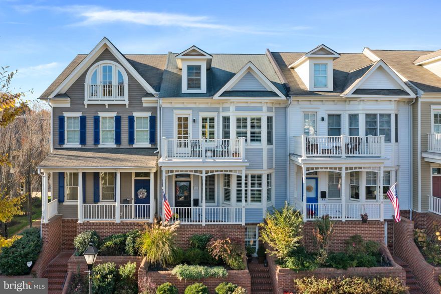 Experience easy elegance and in town living with one of Acton's Landing  largest townhome residence - an expansive 3000 square foot haven.   Immerse yourself in the perfect blend of modern comfort and timeless charm just steps from the waterfront park on Spa Creek which offers public access for kayaks and water taxis. Extra-wide and generously proportioned living spaces on every level provide exceptional light and comfort. The remodeled kitchen (2023) features a new granite island, countertops, stylish backsplash, and top end stainless steel appliances and abundant workspaces. Wide plank flooring in the dining room/living room with built-in bookcases and cabinetry. Enjoy views from the exceptionally wide deck running the full length of the home overlooking the private and unique Community Courtyard.
The second floor boasts a spacious primary suite with three spacious closets, a second ensuite bedroom, and convenient laundry facilities. The top floor offers bonus space for work or exercise along with a full bath and bedroom. The lower level office/4th bedroom and full bath provide privacy for guests. Spacious two car garage. Crown moldings, new lower level carpet, and peek-a-boo views of Spa Creek add the finishing touches to this refined residence that is walking distance to City Dock and your choice of restaurants.