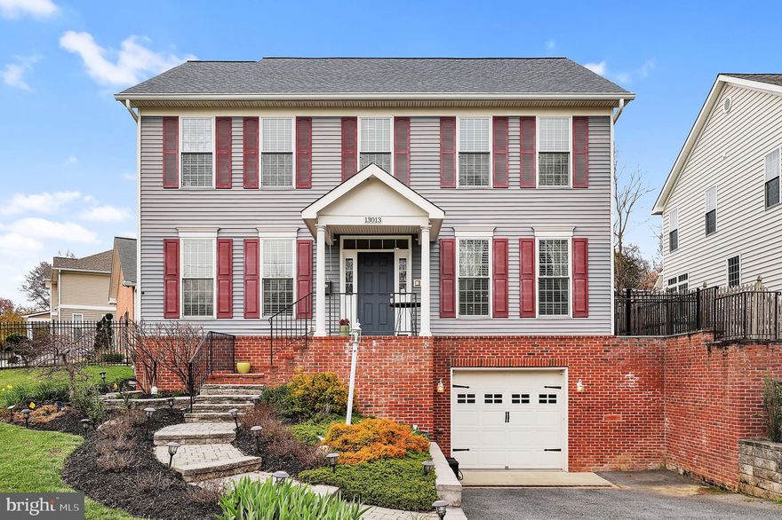 Welcome to 13013 Connecticut Avenue, a beautifully maintained and thoughtfully designed Colonial home in Silver Spring’s desirable 20906 zip code. Nestled just moments from the scenic Matthew Henson State Park trails and the vibrant Aspen Hill Shopping Center, this picture-perfect residence offers the perfect blend of nature, convenience, and comfort.

Built less than 10 years ago with today’s modern lifestyle in mind, this 4-bedroom, 3.5-bathroom home boasts an open and airy floor plan filled with natural light from expansive windows throughout. The main level features high ceilings and gleaming hardwood floors, a spacious living room with a cozy fireplace, and a gourmet eat-in kitchen outfitted with timeless white cabinetry, granite countertops, and a large center island. The kitchen flows seamlessly into a separate dining room that opens onto a new flagstone patio (2023)—perfect for indoor-outdoor living and entertaining.

Upstairs, the oversized primary suite offers a peaceful retreat with soaring ceilings, ample closet space, and a spa-inspired en-suite bath featuring a soaking tub and walk-in shower. Two additional large bedrooms share a second full bath, and a convenient second-floor laundry room makes daily routines effortless.

The fully finished lower level adds versatile space with a full bathroom—ideal for a home office, gym, playroom, or guest suite. Enjoy added privacy with a fully fenced yard and stunning professional landscaping in the front yard.

Recent Updates & Features: Bosch French door refrigerator (2022), Updated lighting fixtures throughout, Fresh paint on the main floor, basement, and most of the upper level, New flagstone patio built in 2023. 

This home is located in a Convenient Location.  Within walking distance to grocery stores, coffee shops, and retail at Aspen Hill Shopping Center.  Adjacent to miles of scenic trails from Matthew Henson State Park connecting to Rock Creek Park, minutes to I-200 and I-495 and just 2 miles to Glenmont Metro. 

This is more than just a home—it's a lifestyle. Don’t miss your opportunity to own this exceptional Colonial gem in the heart of Silver Spring.