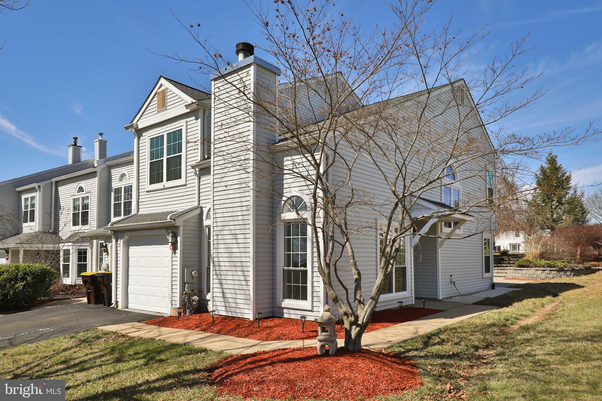 Newly remodeled throughout.. New flooring, freshly painted, new kitchen with granite countertop, island and stainless steel appliances, remodeled 2.5 bathrooms, glass railings staircase, led spot lights all throughout the house and much more. Living room with cathedral ceilings and wood burning fireplace. Some replaced windows. The professionally hardscaped multi-tiered back patio is a true oasis for relaxation and outdoor entertainment. There is an attached garage for parking or additional storage freshly painted and sealed