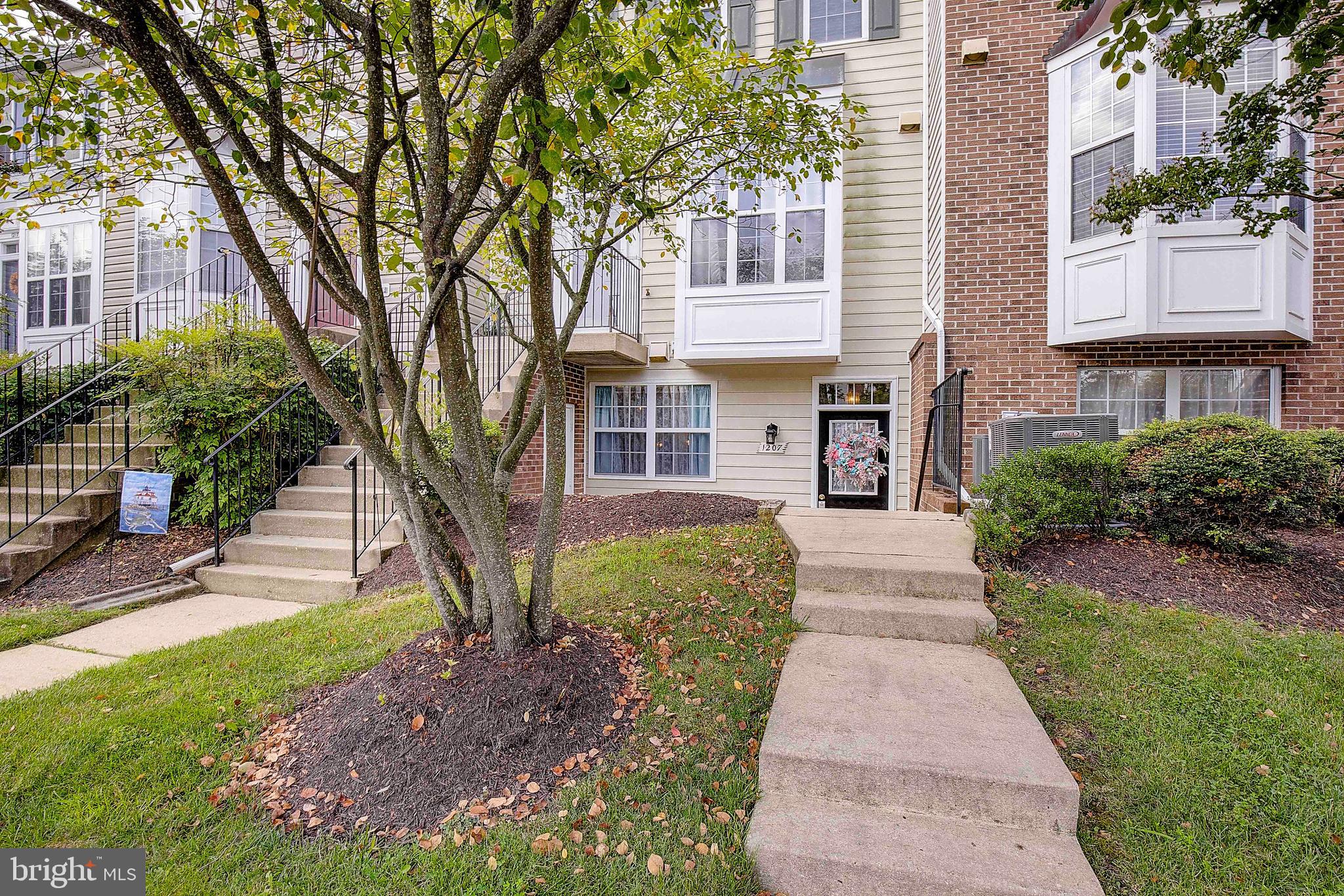 Welcome to this pristine lower-level condo in Crofton, MD. This ranch-style residence offers a comfortable and inviting atmosphere with two bedrooms and two bathrooms. The upgraded vinyl laminate flooring flows seamlessly throughout, providing a modern touch. Cozy up by the fireplace during chilly evenings, or enjoy the privacy of the fenced courtyard. The sleek black-on-black appliances enhance the kitchen's aesthetic appeal. The open floor plan concept creates a spacious living area, perfect for entertaining guests. With two assigned parking spaces, convenience is at your fingertips. Location! Location! Location! This community is only a short commute to Washington, DC, Annapolis, Baltimore, and nearby Crofton High School. Also, convenient to Ft. Meade, Andrews AFB, NSA, and the U.S. Naval Academy. You are moments away from great shopping, tons of restaurants with the Waugh Chapel Towne Centre, and The Village at Waugh Chapel nearby. As a homeowner in Nantucket Mews, you are also a Crofton Village Pool & Recreation Association (CVP&RA) member!!! The CVP&RA also offers other amenities around the community, such as Tennis courts, Basketball and Volleyball courts, Ball fields, Playgrounds, and Pavilions.